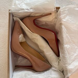 Christian Louboutin Cream and Red Heels with Classic Pump Style